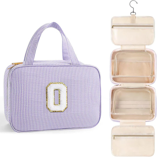 TOPEAST Travel Toiletry Bag for Women - Hanging Toiletry Bag Makeup Bag, Portable Toiletries Cosmetic Bag, Airplane Travel Essentials - Letter O, Purple
